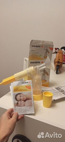 Молокоотсос medela ручной