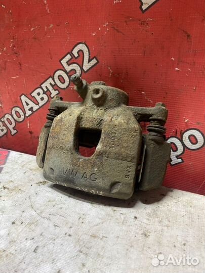 Суппорт тормозной передний правый Volkswagen Polo