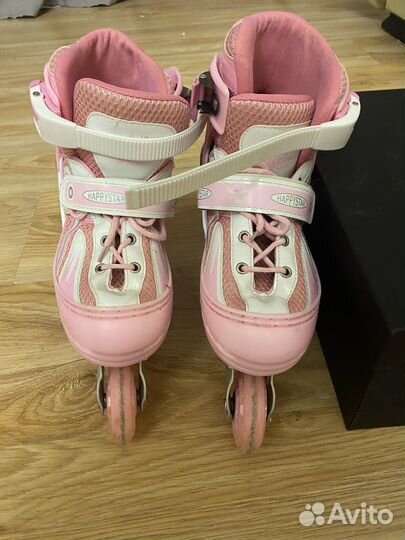 Роликовые коньки