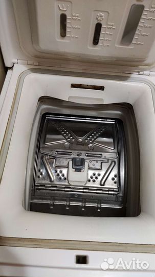 Стиральная машина с вертикальной загрузкой