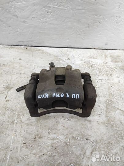 Суппорт тормозной передний правый Kia Rio 3