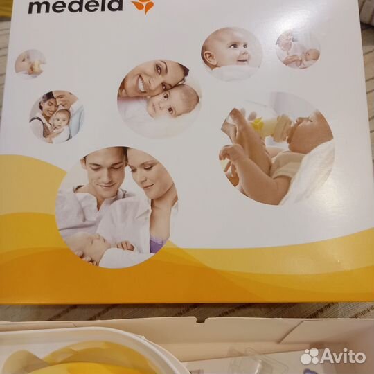 Молокоотсос medela электрический