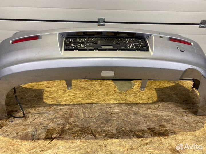 Бампер задний Mitsubishi Lancer