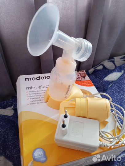 Молокоотсос medela электрический