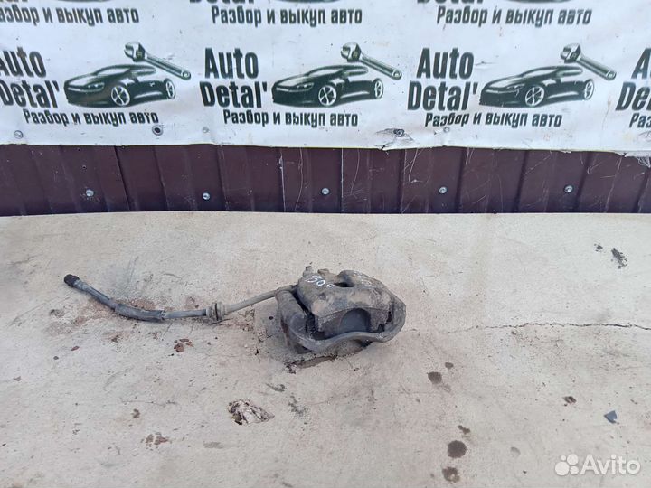 Суппорт передний левый opel Corsa d