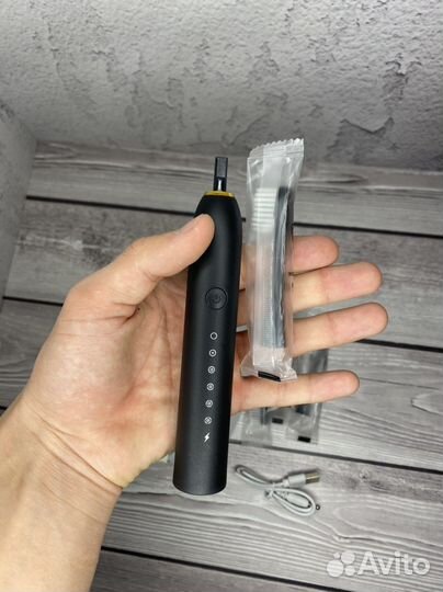 Электронная зубная щетка