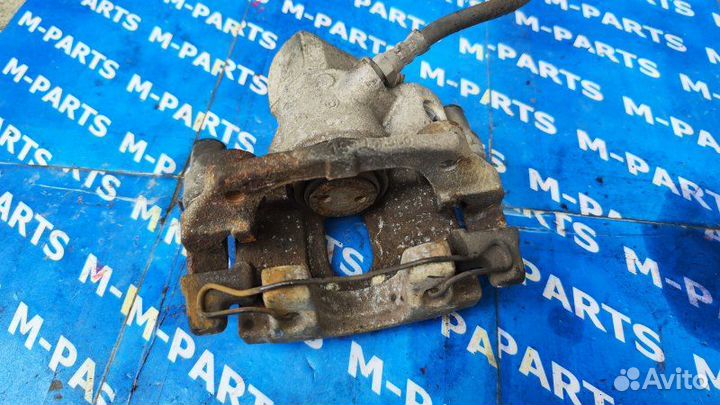 Суппорт задний левый Mazda Axela blefp LF-VD 2010