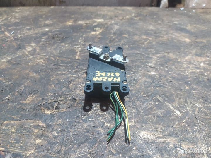 Моторчик заслонки отопителя Mazda 626 GE (1991—1997)