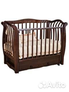 Детская кроватка с маятником и ящиком