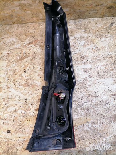 Фонарь левый Mitsubishi Grandis NA4W