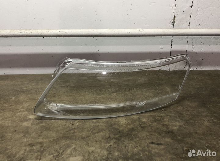 Стекла фар Audi A6 C6