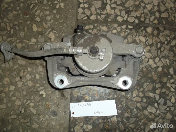 Суппорт передний левый (Hyundai i30, Kia Ceed)