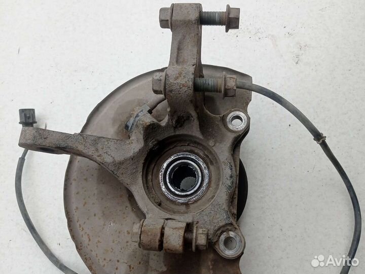 Кулак поворотный передний левый Mitsubishi Lancer