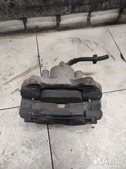 Суппорт передний правый Opel Astra H 2004-2015