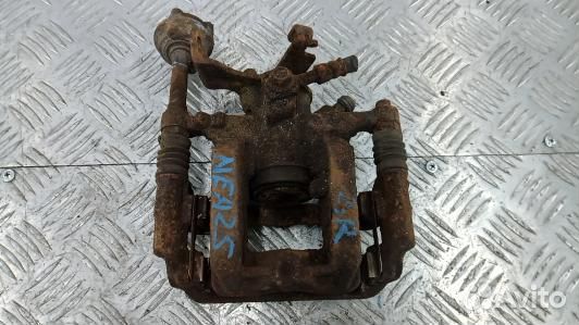 Суппорт тормозной задний правый opel astra J (NEA2