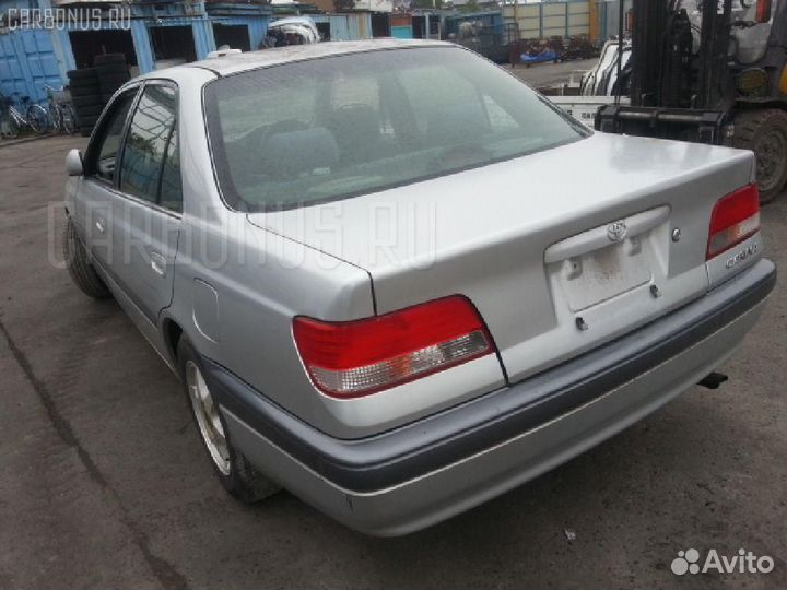 Подкрылок 53876-20340 на Toyota Carina AT212 5A-FE