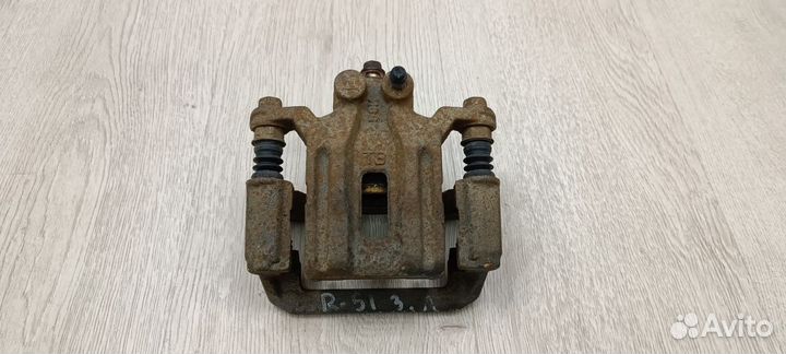 Суппорт тормозной задний nissan pathfinder R51 Лев