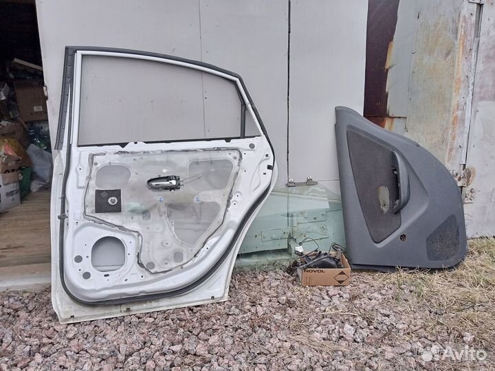 Дверь правая задняя Nissan Almera g15