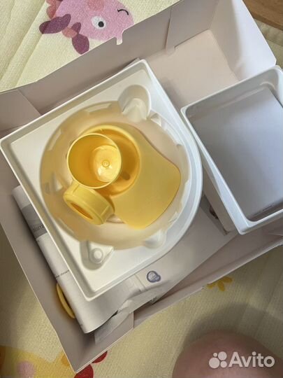 Молокоотсос medela электрический