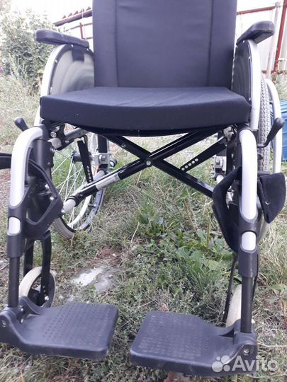 Инвалидная коляска