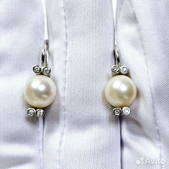 Золотые серьги с бриллиантом