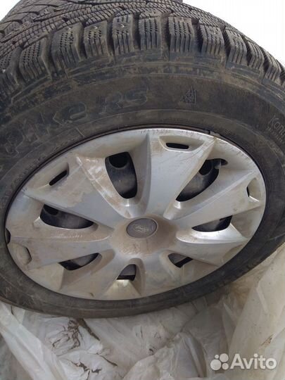 Шины шипованые с дисками Форд и колпаками