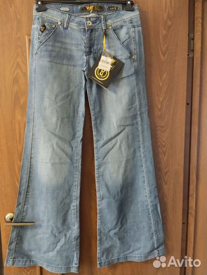 Джинсы женские широкие