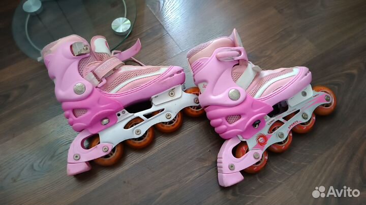 Роликовые коньки