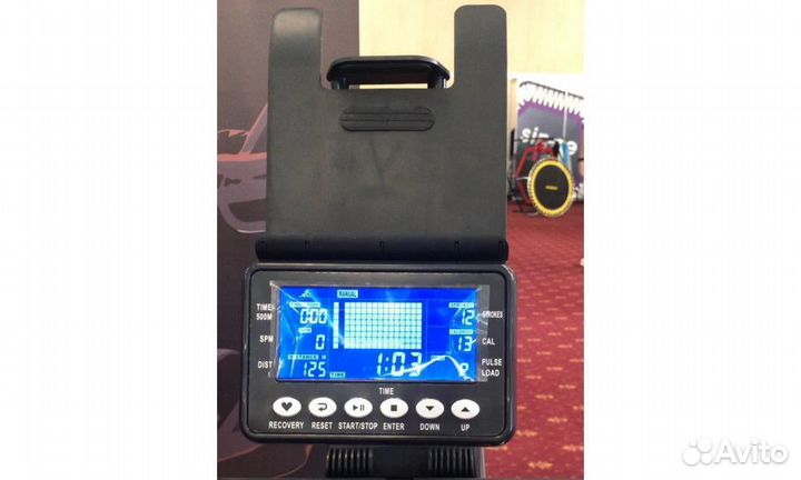 Гребной тренажер