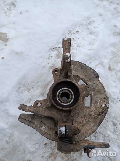 Кулак поворотный левый Hyundai Sonata 6 YF