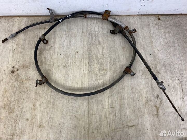 Трос ручника задний левый Mitsubishi Pajero Sport