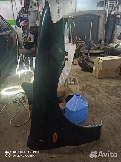 Крыло правое mazda 626