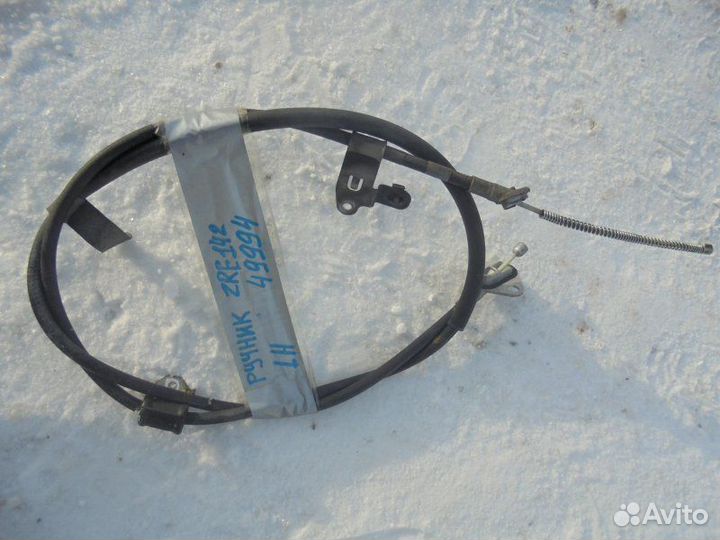 Трос ручника левый Toyota Corolla Fielder ZRE142