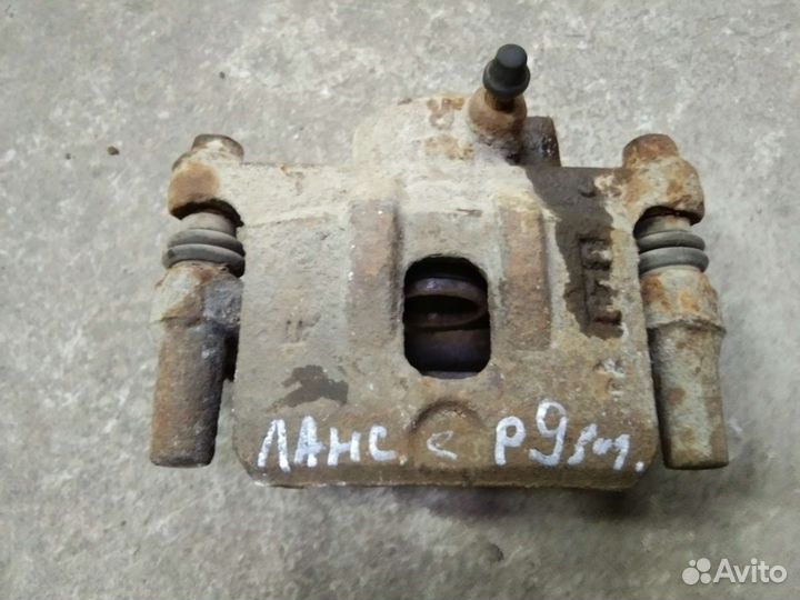 Суппорт задний Митсубиси Лансер 9