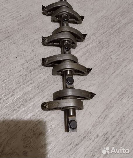 Ось рокеров, коромысел, Логан