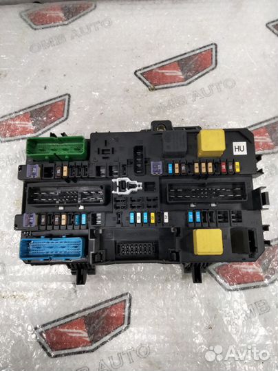 Блок предохранителей в багажник Опель Астра Н