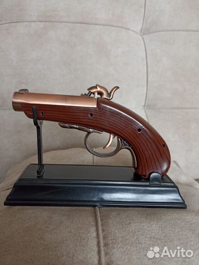 Зажигалка в виде пистолета