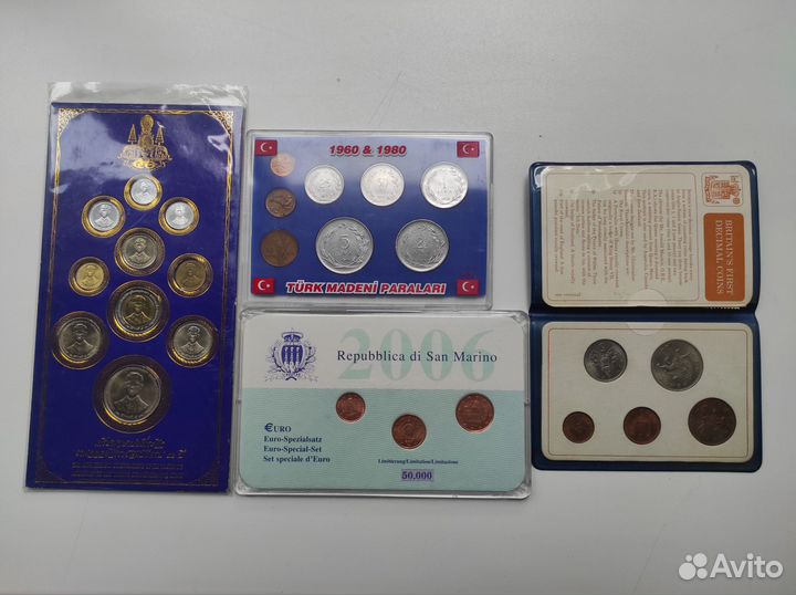 4 набора иностранных монет