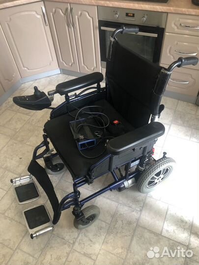 Инвалидная коляска с электроприводом