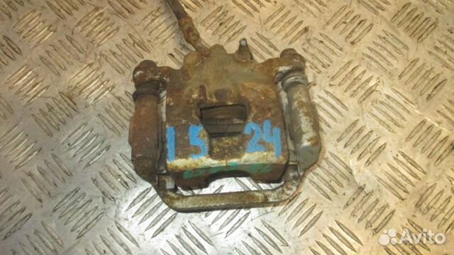 Суппорт задний левый Nissan Altima