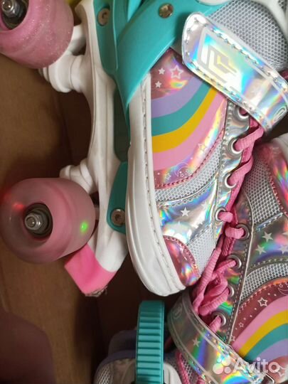 Роликовые коньки