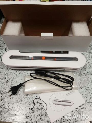 Вакуумный упаковщик вакууматор