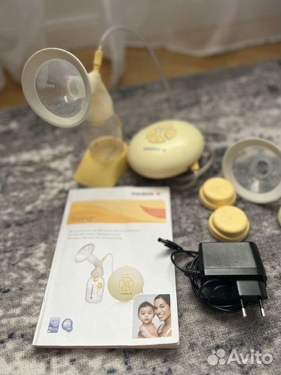 Молокоотсос medela swing электрический