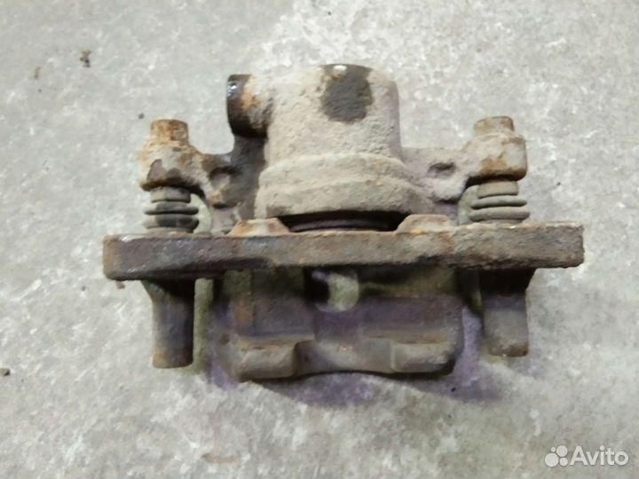 Суппорт задний Митсубиси Лансер 9