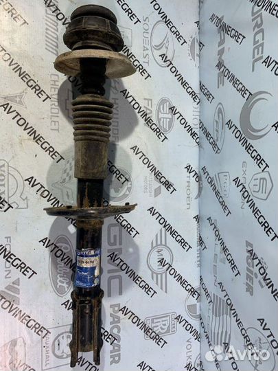 Стойка амортизатор передняя левая Renault Logan 1