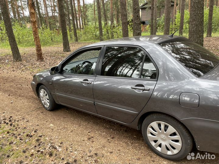 Mitsubishi Lancer 1.6 МТ, 2006, 167 000 км