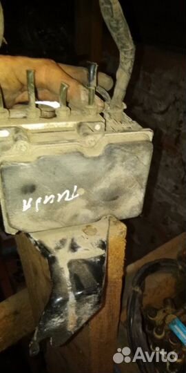 Блок ABS Nissan Tiida C11