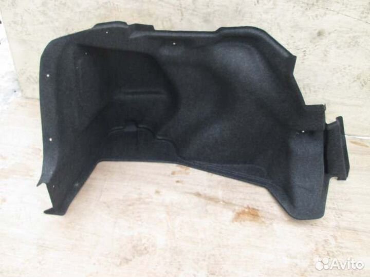 Обшивка багажника левая Toyota Corolla NZE121