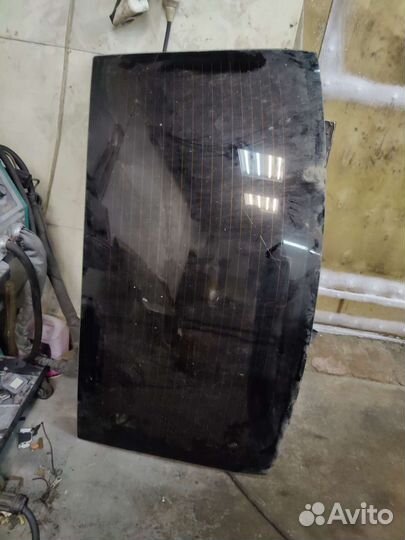 Заднее стекло Renault Logan до 2014