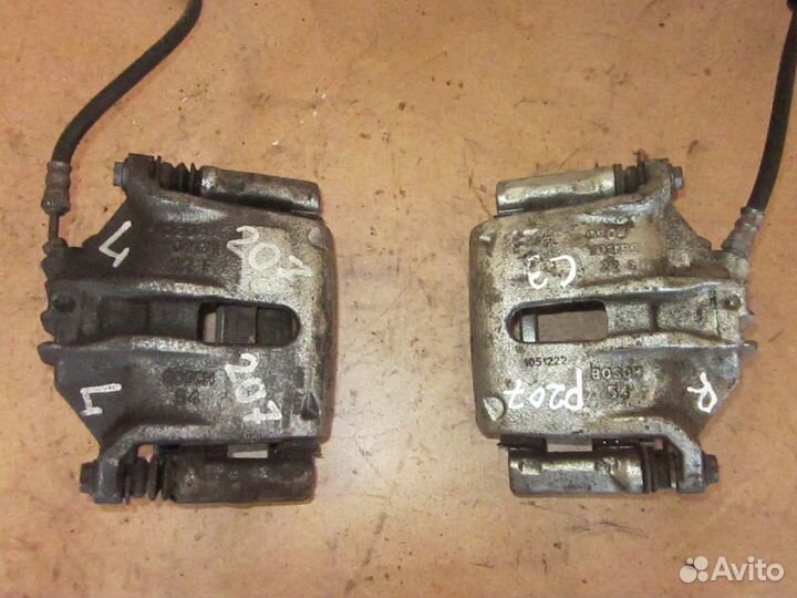 Суппорт тормозной передний Пежо партнер типи 1.6